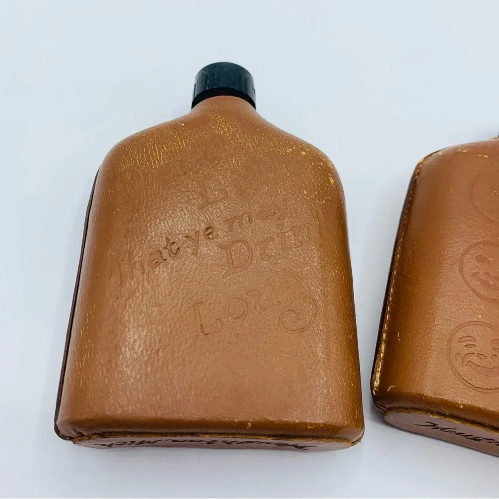 Pair Of Vintage Souvenir Leather Wrapped Glass Whiskey Flasks
